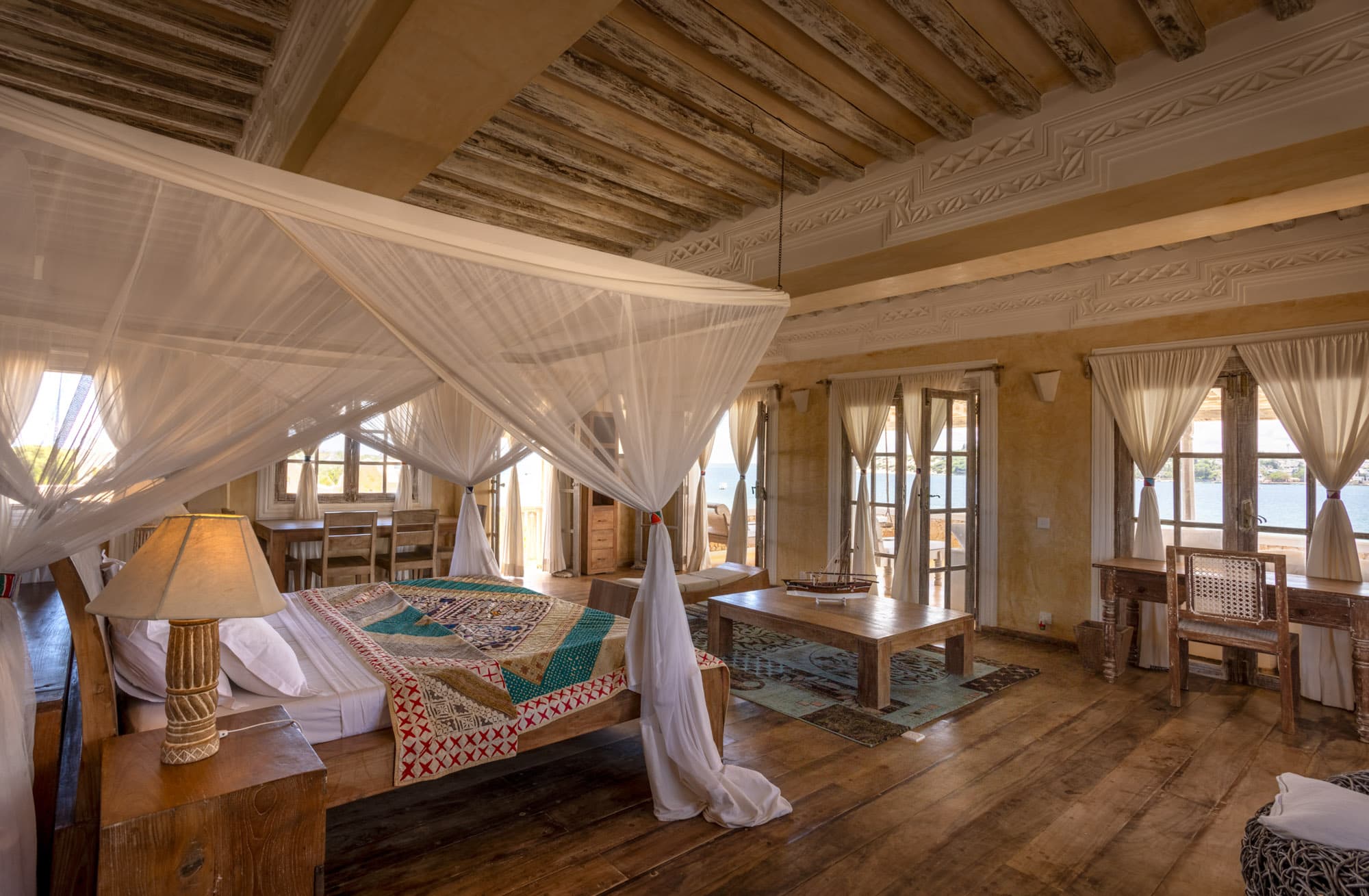 A spacious bedroom in the main house at Amani House